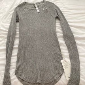 Lululemon sweater. Never worn, still with tags. Size 6.